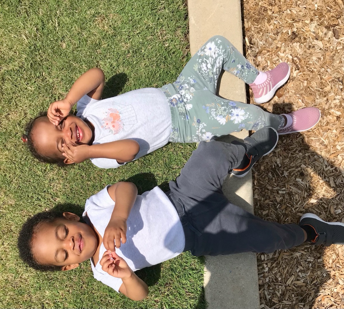 Laughing in the grass